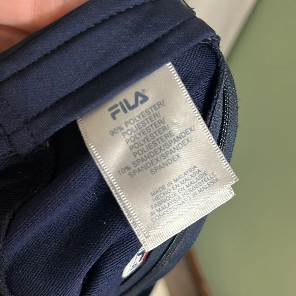 A8- small womens blue athletic skirt size S FILA